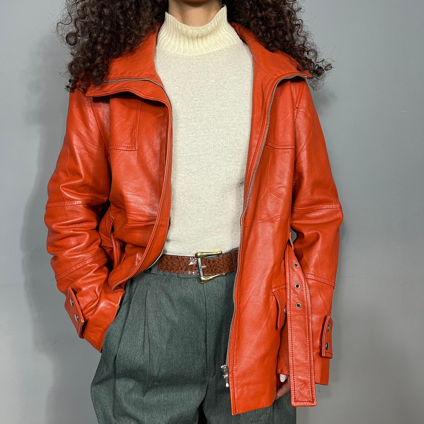 Orange leather jacket with belt